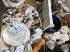 TWO TRAYS OF ASSORTED CERAMICS TO INCLUDE FIGURES, NIKKO COFFEE SERVICE, GOEBEL CUP AND SAUCER ETC.