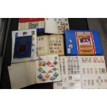 A QUANTITY OF VINTAGE STAMP ALBUMS AND CONTENTS