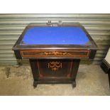 AN EDWARDIAN EBONISED DAVENPORT DESK W-56 CM