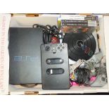 A SONY PS2 CONSOLE WITH GAMES AND ACCESSORIES