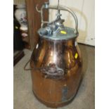 A VINTAGE COPPER MILK CHURN BY MANUS OF SWEDEN