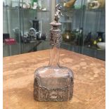 LATE VICTORIAN ETCHED GLASS AND SILVER-MOUNTED SCENT BOTTLE the squat body of the bottle etched with