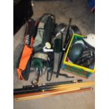 A SELECTION OF GOLF CLUBS, HELMETS, CUES ETC