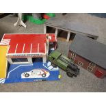 A BOX OF WOODEN TOYS TO INCLUDE A PULL ALONG TRAIN, AND CAR GARAGE ETC.