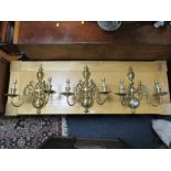 A SET OF THREE BRASS WALL LIGHTS