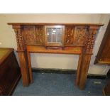 A 1930'S OAK BARLEYTWIST FIRE SURROUND WITH GLAZED CABINET ABOVE H-133 W-144 CM