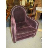 A DECO STYLE PURPLE UPHOLSTERED ARMCHAIR