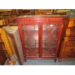 A REPRODUCTION MAHOGANY GLAZED BOOKCASE W-88 CM