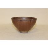 A GLAZED ORIENTAL STYLE BOWL - DIAMETER 13CM