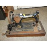 A VINTAGE SINGER SEWING MACHINE