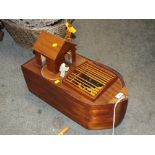 A HANDMADE MAHOGANY NOAHS ARK PULL ALONG TOY, L 57 CM