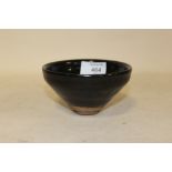 A GLAZED CONICAL ORIENTAL STYLE BOWL - DIAMETER 12CM