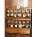 A VINTAGE WOODEN SPICE RACK