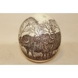 A SIGNED ENGRAVED OSTRICH EGG STUDY OF A WATER BUFFALO