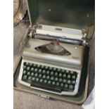 A CASED VINTAGE DIANA TYPEWRITER