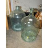 TWO GLASS CARBOY BOTTLES