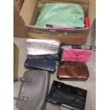 A BOX OF LADIES HANDBAGS TOGETHER WITH THREE SUITCASES TO INCLUDE A BOXED EXAMPLE