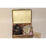 A BOX OF COSTUME JEWELLERY, COINS ETC