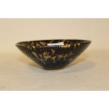A GLAZED ORIENTAL STYLE CONICAL SHAPED BOWL - DIAMETER 15.5CM