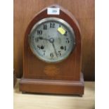 A DOME TOPPED INLAID MAHOGANY MANTEL CLOCK