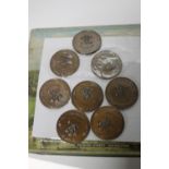 A TIN OF CIRCA 150 1981 ROYAL WEDDING BRONZE MEDALS DEPICTING PRINCE CHARLES AND LADY DIANA SPENCER