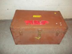 A LARGE LEATHER AND STEEL TRAVEL TRUNK