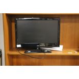 AN ALBA 18" FLATSCREEN TV