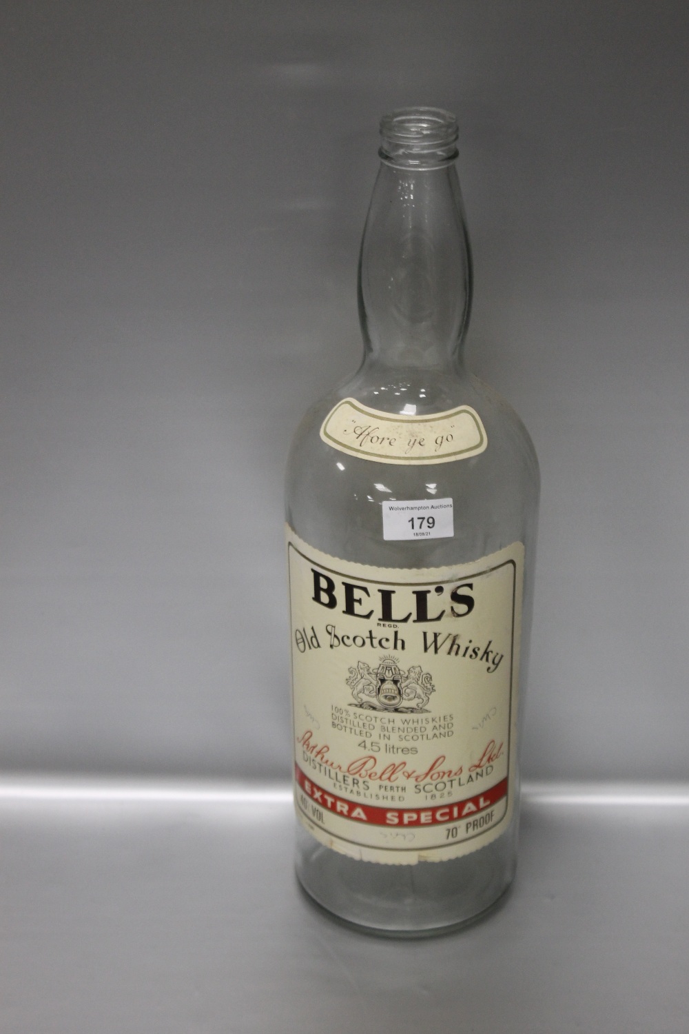 A VINTAGE BELLS OLD SCOTCH WHISKY BOTTLE