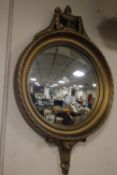 A GILT FRAMED CONVEX WALL MIRROR 40 CM INCLUDING FRAME