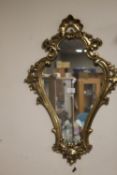 A GILT FRAMED WALL MIRROR H 71 CM