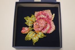 A LARGE BROOCH IN THE FORM OF A ROSE
