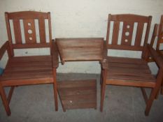 A WOODEN GARDEN LOVE SEAT