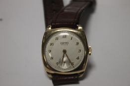 A 9 CT GOLD CASED GENTLEMAN'S WRIST WATCH WITH INSCRIPTION TO CASE BACK