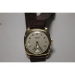 A 9 CT GOLD CASED GENTLEMAN'S WRIST WATCH WITH INSCRIPTION TO CASE BACK