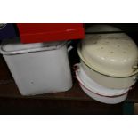 AN ENAMEL BREAD BIN AND TWO ENAMEL LIDDED ROASTING POTS