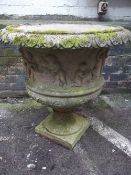 AN EXTRA LARGE RECONSTITUTED STONE PLANTER URN AND PLINTH