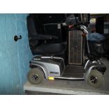 AN INVALID SCOOTER