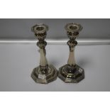 A PAIR OF HALLMARKED SILVER CANDLESTICKS (DAMAGE TO BASES)