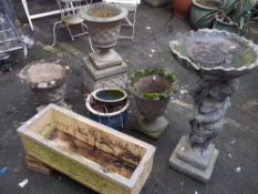 A SELECTION OF CONCRETE PLANTERS (6)