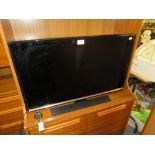 A SAMSUNG 31" FLATSCREEN TV - HOUSE CLEARANCE