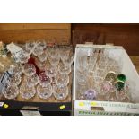 TWO TRAYS OF CUT GLASS TO INCLUDE PAPERWEIGHTS, CRYSTAL DRINKING GLASSES ETC.