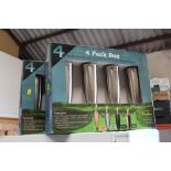 THREE PACKS OF 4 METAL GARDEN TORCHES