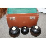 A CASE OF VINTAGE LAWN BOWLS