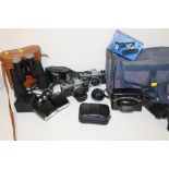 A COLLECTION OF VINTAGE CAMERAS & ACCESSORIES TOGETHER WITH VINTAGE BINOCULARS ETC