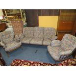 AN ERCOL HOOPBACK THREE PIECE COTTAGE SUITE