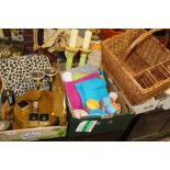 TWO TRAYS OF MODERN DECORATIVE KITCHEN ITEMS TO INCLUDE ANIMAL PRINT NAPKIN RINGS, CANDLE STICKS