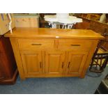 A MODERN LIGHT OAK SIDEBOARD WITH TWO DRAWERS H-92 CM W-140 CM