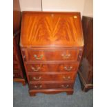 A REPRODUCTION MAHOGANY BUREAU W-55 CM