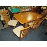 A MODERN EXTENDING KITCHEN TABLE AND 4 CHAIRS