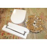 A MODERN LEOPARD PRINT PATTERN SINK BASIN TOGETHER WITH A VILLEROY AND BOCH TOILET SEAT AND THREE